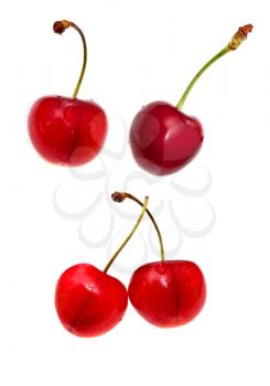 red sweet cherries closeup isolated on white