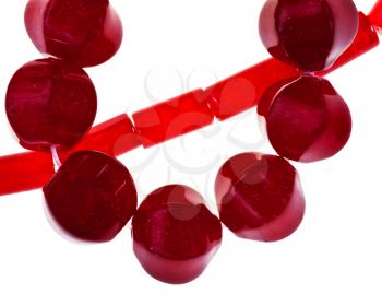 strings of red jade necklaces isolated on white background