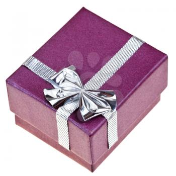 small purple gift box with silver bow isolated on white background