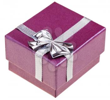 small magenta paper gift box with silver bow isolated on white background
