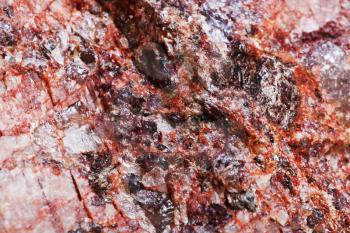 background from rock with crystalline inclusions close up