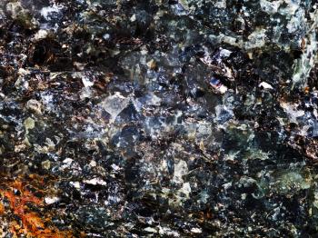 background from rock with crystal and metallic inclusions