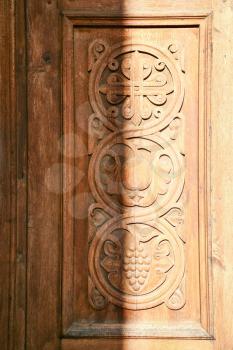 decor of old carved wooden door in Tatev Monastery in Armenia