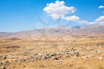view of stone plateau with Zorats Karer (Carahunge) boulders - pre-history megalithic monument in Armenia