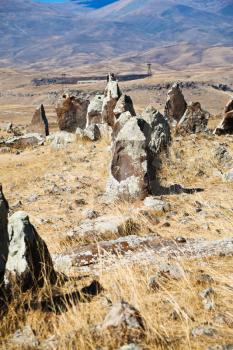 standing menhirs of Zorats Karer (Carahunge) - pre-history megalithic monument in Armenia