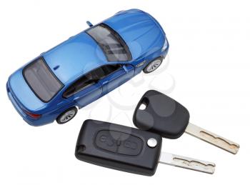 above view of two vehicle keys and model car isolated on white background