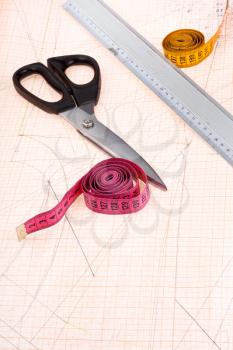 graph paper and tailors shears, ruler, measure tapes at graph paper
