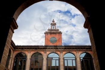tower and courtyard of Archiginnasio palace - the first official headquarters for the University of Bologna
