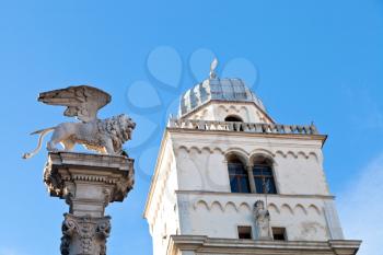 column with winged lion and tower of Palazzo del Capitanio in Padua, Italy