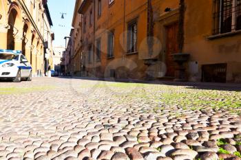 cobblestone pavement on Piazza Santo Stefano in autumn day in Bologna, Italy