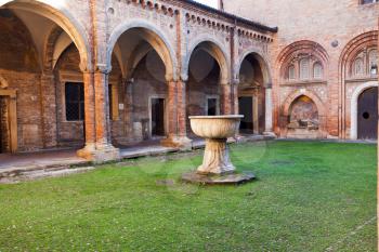 Courtyard of Pilate (Piazza di Pilatus) in Basilica of Santo Stefano, Bologna. Legend has it that the basin in the courtyard was the one in which Pontius Pilate washed his hands after condemning Chris