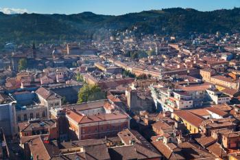 aerial view from Asinelli Tower on Bologna with mountain, Italy