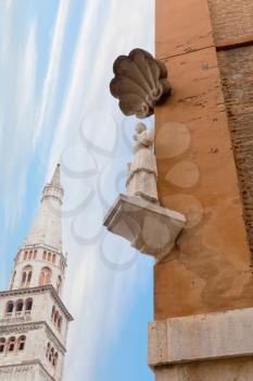 The Bonissima is medieval statue on the corner of the Town Hall and Torre della Ghirlandina in Modena, Italy