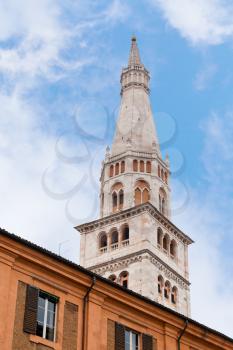 torre della ghirlandina - bell tower of Modena Cathedral under urban houses, Italy
