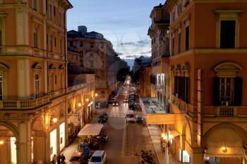 view of via dell Indipendenza in Bologna, Italy in autumn evening