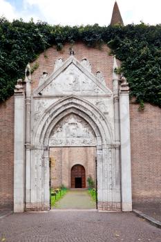 entrance in court of antique basilica San Giovanni Evangelista in Ravenna, Italy