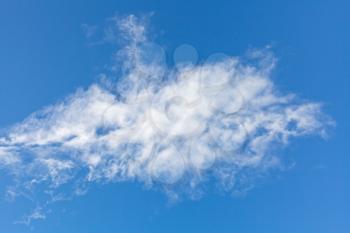 one small white cloud in italian blue sky in autumn