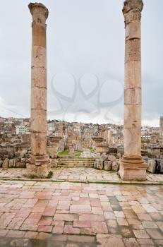 view through antique Artemis temple in ancient city  Gerasa to modern Jerash , Jordan