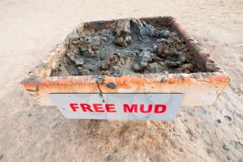 stand with free mineral mud on coast of Dead Sea