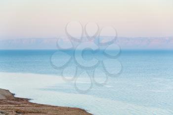 early pink sunrise on Dead Sea coast, Jordan