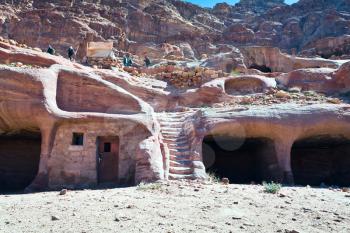 modern bedouin house in ancient cave in Petra, Jordan