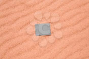 grey square standard on red sand od Wadi Rum desert, Jordan