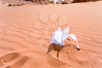 note book in red sand dune of Wadi Rum desert, Jordan