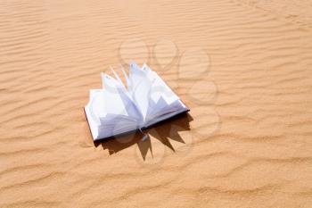 note book in sand dune of Wadi Rum desert, Jordan