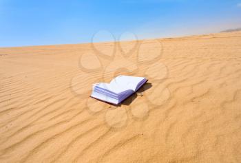 note book in sand dune of Wadi Rum desert, Jordan