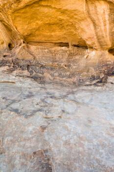 Petroglyphs on sandstone rock in Wadi Rum desert, Jordan