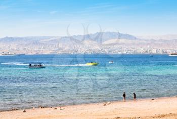 municipal Aqaba beach and view on Eilat town from Jordan