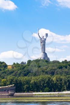 riverside view on monument of Mother of the Fatherland from Dnieper River in Kiev, Ukraine