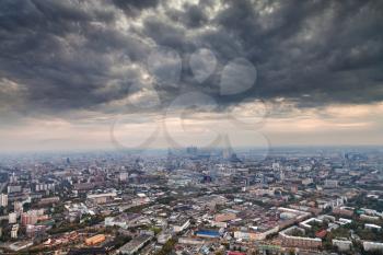 dark grey autumn clouds under big city, Moscow