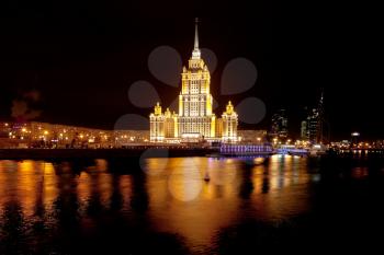 night view of vysotka building on Taras Shevchenko embankment in Moscow, Russia
