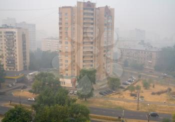 strong smog under city in summer day