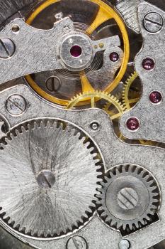 steel machinery of old mechanical watch close up
