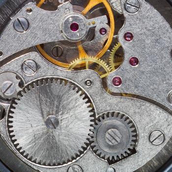 clockwork of wristwatch with gears, spring close up