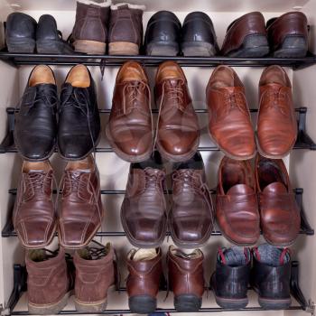shoes cabinet with used leather men's slippers