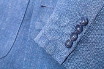 sartorial background - fragment of blue silk men's suit close up