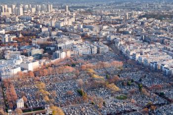 view on Montparnasse Cemeteryr and panorama of Paris in winter afternoon