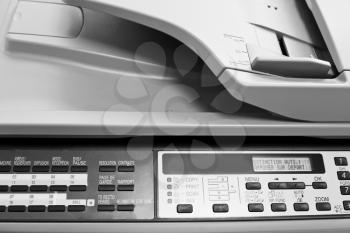 metal control panel of big copier close up