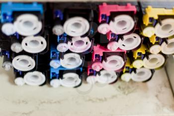 disassembled colour cartridges of color printer