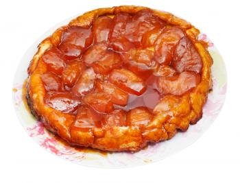 apple pie Tatin on plate isolated on white background