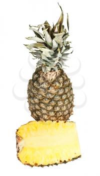 cross section of pineapple and one ripe pineapple isolated on white background
