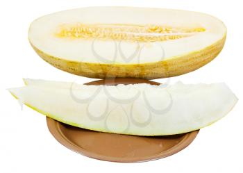 two slices and Uzbek-Russian Melon (mirzachul melon, gulabi melon, torpedo melon) on plate isolated on white background