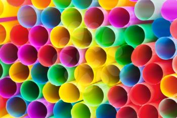 abstract background from multicolored plastic drinking straws close up