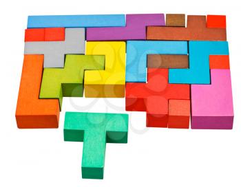 multicoloured puzzle blocks and T-shaped piece isolated on white background