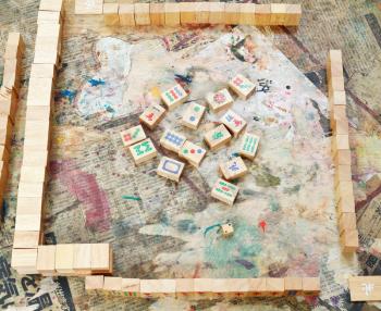playing field of mahjong desk game on shabby table