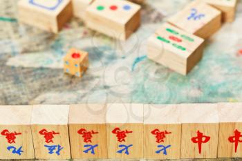 wooden tiles close up in mahjong game during playing round