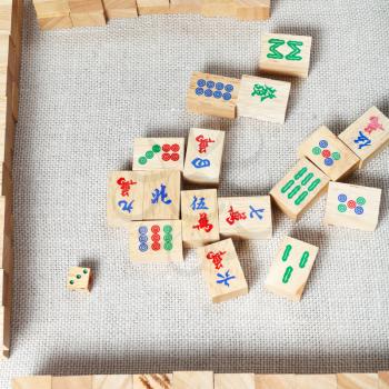 top view of playing field of mahjong desk game on textile table